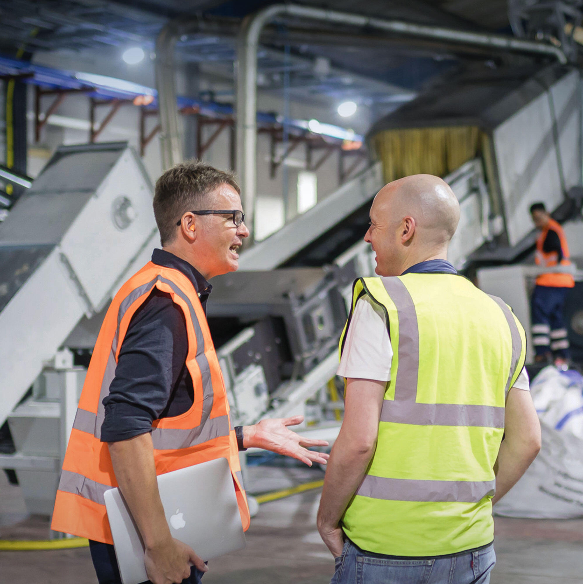 David Bargery from Regis Machinery visiting a Recycling plant with Starlinger equipment in the background